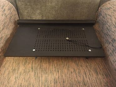 Postolje za laptop sa improvizovanim "nogarima" koji ga odvajaju od na lalafo.rs — 1 Postolje za laptop sa improvizovanim "nogarima" koji ga odvajaju od — 1