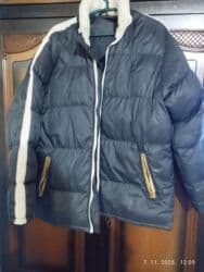 Zimska puffer jakna, muški/unisex model. nošeno ima pocepano vidi se na lalafo.rs Zimska puffer jakna, muški/unisex model. nošeno ima pocepano vidi se