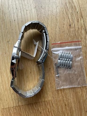 Muški i zenski ručni sat od nerdjajućeg čelika. - Kućište od na lalafo.rs — 8 Muški i zenski ručni sat od nerdjajućeg čelika. - Kućište od — 8