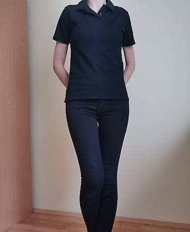 Crna ženska polo majica S/M Ženska majica sa kragnom. Veličina ne na lalafo.rs Crna ženska polo majica S/M Ženska majica sa kragnom. Veličina ne
