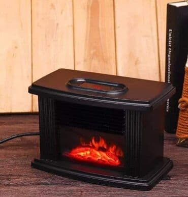 Mini električni grejač sa efektom kamina - Tip: prenosni na lalafo.rs Mini električni grejač sa efektom kamina - Tip: prenosni