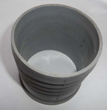 Cilindrični plastični reduktor cevi u sivoj boji, dizajniran za na lalafo.rs Cilindrični plastični reduktor cevi u sivoj boji, dizajniran za