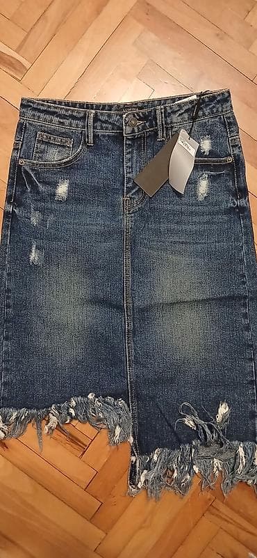 kom sa etiketom: Farmer suknja – model “Lumina” - Materijal: 100% pamuk (džins) at lalafo.rs — 1 kom sa etiketom: Farmer suknja – model “Lumina” - Materijal: 100% pamuk (džins) — 1