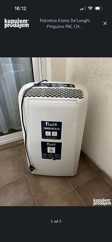 Pokretna klima De’Longhi Pinguino PAC CN – 10.000 BTU/h - Kapacitet na lalafo.rs — 1 Pokretna klima De’Longhi Pinguino PAC CN – 10.000 BTU/h - Kapacitet — 1