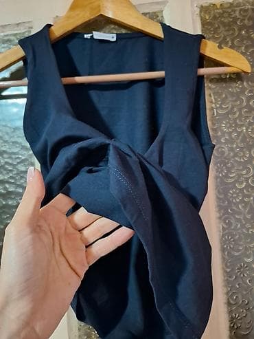 Teget plava ženski top bez rukava.Poduplana u predelu grudi, idealna na lalafo.rs — 3 Teget plava ženski top bez rukava.Poduplana u predelu grudi, idealna — 3