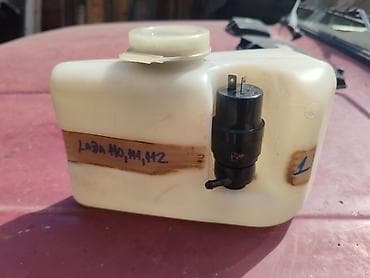 Posuda za tečnost zadnjeg brisača sa motoricem Lada 112. Polovno na lalafo.rs Posuda za tečnost zadnjeg brisača sa motoricem Lada 112. Polovno