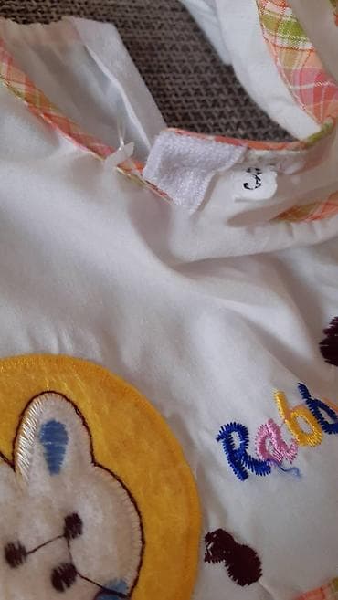 Bela dečja haljina sa kratkim puf rukavima i okruglim izrezom na lalafo.rs — 4 Bela dečja haljina sa kratkim puf rukavima i okruglim izrezom — 4