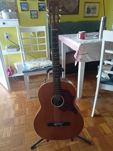 Akustična gitara sa klasičnom glavom i otvorima, čelične žice. - na lalafo.rs Akustična gitara sa klasičnom glavom i otvorima, čelične žice. -