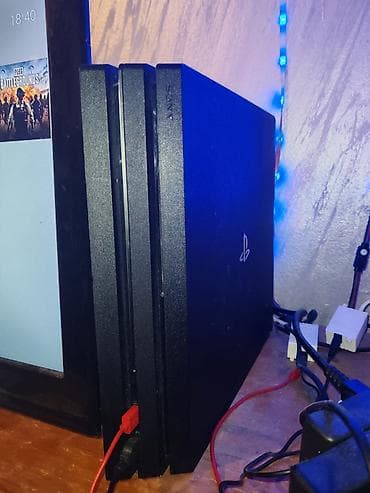 PlayStation 4 Pro konzola (CUH-70xx serija) sa pratećom opremom i na lalafo.rs — 8 PlayStation 4 Pro konzola (CUH-70xx serija) sa pratećom opremom i — 8
