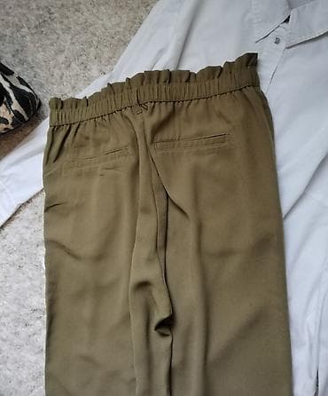 zenske original guess: Pantalone u pastelnoj zelenoj boji visokog struka sa dugmicima na lalafo.rs — 4 zenske original guess: Pantalone u pastelnoj zelenoj boji visokog struka sa dugmicima — 4