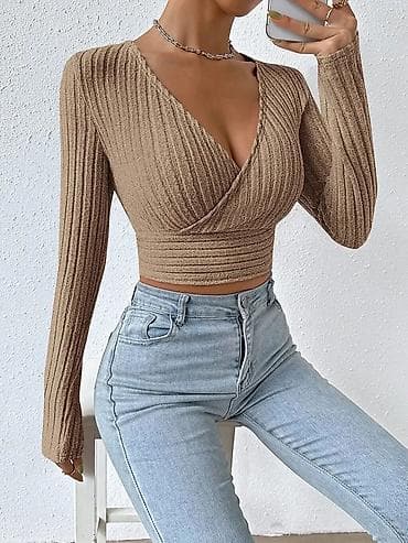 Rebrasti krop top Odlično se kombinuje sa garderobom visokog struka na lalafo.rs Rebrasti krop top Odlično se kombinuje sa garderobom visokog struka