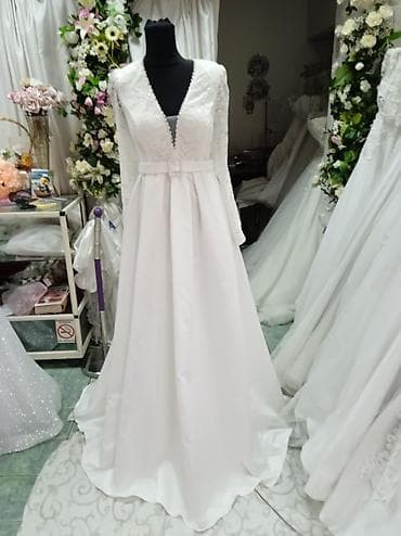 Nova plus size venčanica koja vizuelno sužava struk. - Kroј: A-kroј na lalafo.rs Nova plus size venčanica koja vizuelno sužava struk. - Kroј: A-kroј