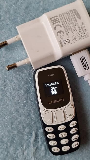 dve suknje po: Mini mobilni telefon L8STAR – dual SIM Opis: - Ultra kompaktan at lalafo.rs — 2 dve suknje po: Mini mobilni telefon L8STAR – dual SIM Opis: - Ultra kompaktan — 2