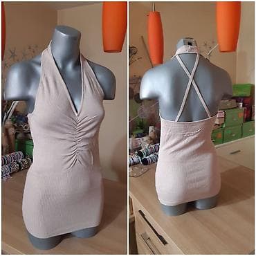 Ženski rebrasti top sa halter izrezom. Izrađen je od mešavine vune i na lalafo.rs — 2 Ženski rebrasti top sa halter izrezom. Izrađen je od mešavine vune i — 2