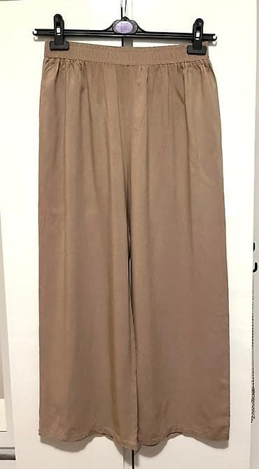 Ε½enske pantalone Ε‘irokih nogavica sa elastiΔnim pojasom, idealne za na lalafo.rs Ε½enske pantalone Ε‘irokih nogavica sa elastiΔnim pojasom, idealne za