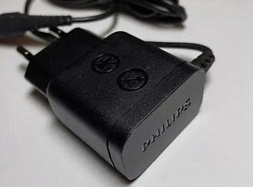 Philips AC/DC adapter punjač za električni brijač - Brend/model na lalafo.rs Philips AC/DC adapter punjač za električni brijač - Brend/model