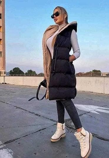 Duga ženska pufna prsluk-jakna sa kapuljačom Gs - Model: dugi na lalafo.rs Duga ženska pufna prsluk-jakna sa kapuljačom Gs - Model: dugi