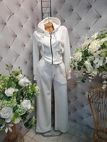 pantalone butiku ali: Ženski komplet trenerke sa kapuljačom i širokim nogavicama - na lalafo.rs — 8 pantalone butiku ali: Ženski komplet trenerke sa kapuljačom i širokim nogavicama - — 8