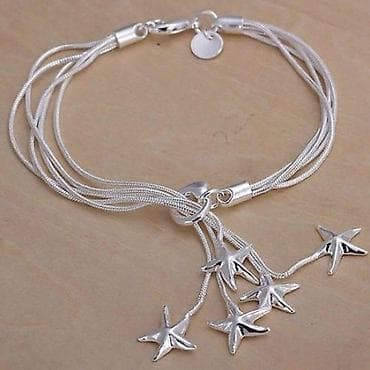 eko koza sa: Srebrnasta narukvica sa zvezdicama - Elegantna višelančana narukvica na lalafo.rs — 1 eko koza sa: Srebrnasta narukvica sa zvezdicama - Elegantna višelančana narukvica — 1