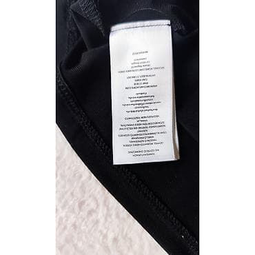 Michael Kors bluza bez rukava u crnoj boji. Elegantna halter silueta na lalafo.rs — 7 Michael Kors bluza bez rukava u crnoj boji. Elegantna halter silueta — 7