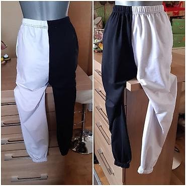 kom sa etiketom: Dukser pantalone crno‑bele, model sa kontrastnim polovinama. - at lalafo.rs — 3 kom sa etiketom: Dukser pantalone crno‑bele, model sa kontrastnim polovinama. - — 3