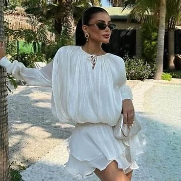 Ženska mini haljina sa volanima – plisirana, lepršava - Kroj: mini na lalafo.rs — 2 Ženska mini haljina sa volanima – plisirana, lepršava - Kroj: mini — 2