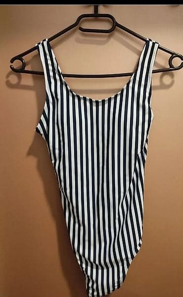 Jednodelni ženski kupaći kostim Esmara. - Dizajn: pruge u tamnoplavoj na lalafo.rs Jednodelni ženski kupaći kostim Esmara. - Dizajn: pruge u tamnoplavoj