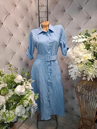 Košulja-haljina sa teksturom talasastog reljefa - Model: midi dužina na lalafo.rs Košulja-haljina sa teksturom talasastog reljefa - Model: midi dužina