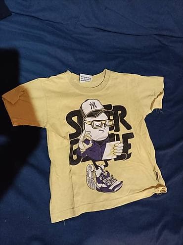 Na prodaju žuta majica kratkih rukava, za uzrast za 10ak godina, u at lalafo.rs — 2 Na prodaju žuta majica kratkih rukava, za uzrast za 10ak godina, u — 2