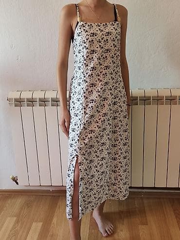 Letnja haljina na bretele, midi dužina, beli osnov sa sitnim crnim na lalafo.rs Letnja haljina na bretele, midi dužina, beli osnov sa sitnim crnim