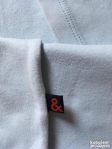 Svetlo plava bodi majca D&G, očuvana.Svetlo plava majca D&G na lalafo.rs — 5 Svetlo plava bodi majca D&G, očuvana.Svetlo plava majca D&G — 5