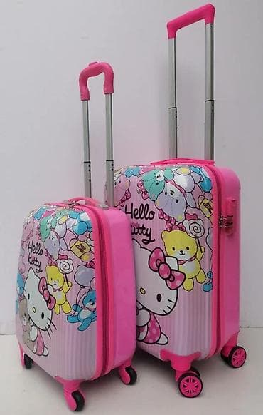 Travel suitcases and bags: Set kofera Hello Kitty – 2 kom - Dizajn: roze sa motivima Hello at lalafo.rs — 1 Travel suitcases and bags: Set kofera Hello Kitty – 2 kom - Dizajn: roze sa motivima Hello — 1