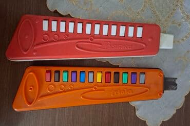 Muzički instrumenti za decu: Muzički instrumenti za decu narandžasti odlično svira malo oštećen ali na lalafo.rs — 1 Muzički instrumenti za decu: Muzički instrumenti za decu narandžasti odlično svira malo oštećen ali — 1