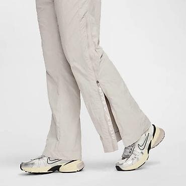 Nike Sportswear Collection Women's Mid-Rise Repel Zip Trousers vel.XS na lalafo.rs — 2 Nike Sportswear Collection Women's Mid-Rise Repel Zip Trousers vel.XS — 2