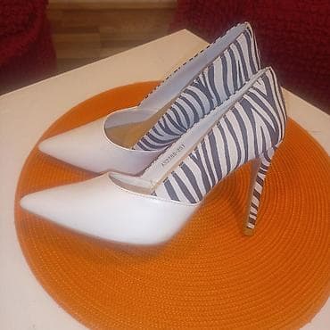 Ženske salonke sa visokom štiklom i zebraste detalje. - Model na lalafo.rs — 3 Ženske salonke sa visokom štiklom i zebraste detalje. - Model — 3