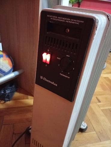 Uljani radijator ELEKTROLUXS od 6 rebara ili 1000 w ispravan na lalafo.rs — 6 Uljani radijator ELEKTROLUXS od 6 rebara ili 1000 w ispravan — 6