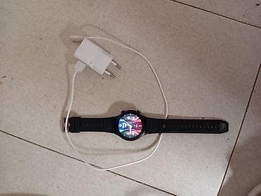 Pocket watches: Pametni sat sa gumiranim crnim kaišem i okruglim kućištem. Ekran u at lalafo.rs — 2 Pocket watches: Pametni sat sa gumiranim crnim kaišem i okruglim kućištem. Ekran u — 2