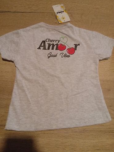 dve suknje po: Dečija majica kratkih rukava – siva melange boja. Brend: alme (etiketa at lalafo.rs — 1 dve suknje po: Dečija majica kratkih rukava – siva melange boja. Brend: alme (etiketa — 1