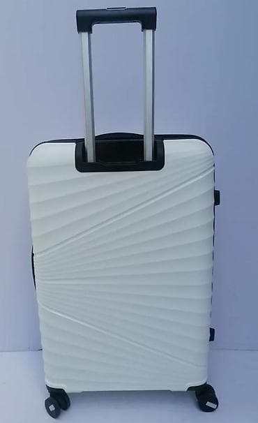 Travel suitcases and bags: === PART 1: TEXTUAL DESCRIPTION === Set od tri bela kofera sa tvrdim at lalafo.rs — 6 Travel suitcases and bags: === PART 1: TEXTUAL DESCRIPTION === Set od tri bela kofera sa tvrdim — 6