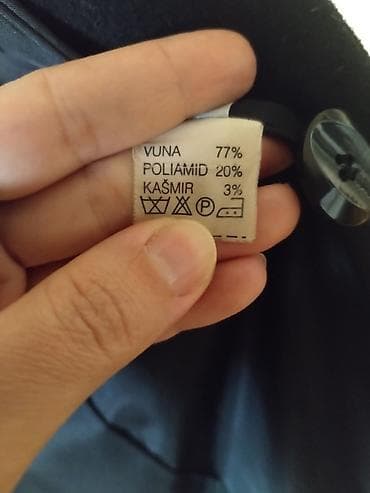 Crni ženski kaput marke Elegant Drašković, izrađen od mešavine vune na lalafo.rs — 1 Crni ženski kaput marke Elegant Drašković, izrađen od mešavine vune — 1