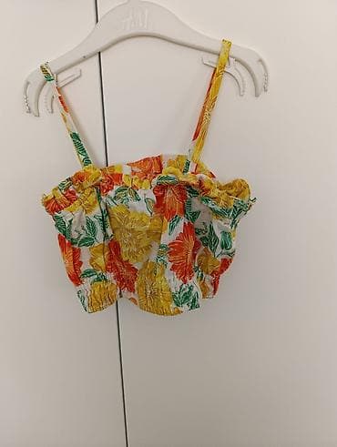 Šareni crop top za devojčice sa cvetnim dezenom, idealan za tople at lalafo.rs Šareni crop top za devojčice sa cvetnim dezenom, idealan za tople
