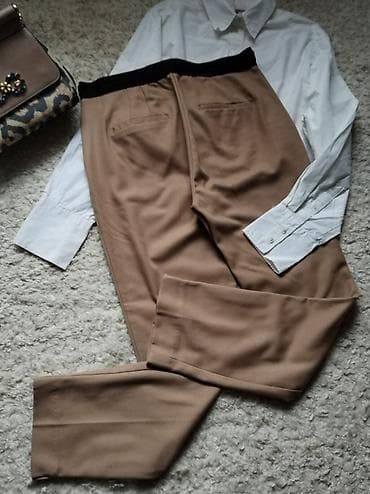 ZARA pantalone u braon boji, odgovaraju M veličini. Perfektno stanje ☆ na lalafo.rs — 1 ZARA pantalone u braon boji, odgovaraju M veličini. Perfektno stanje ☆ — 1