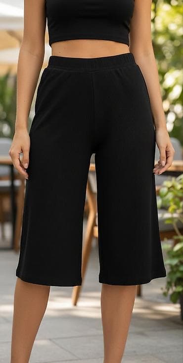 Ženske crne bermude – širok kroj - Dužina do ispod kolena, komotne na lalafo.rs — 1 Ženske crne bermude – širok kroj - Dužina do ispod kolena, komotne — 1