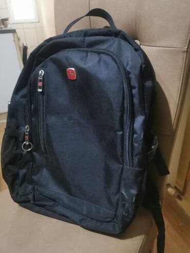 Ostalo: Crni ranac. Made in Swiss ojacan. Nеma ostecenja .Duzina 50cm,sirina na lalafo.rs — 1 Ostalo: Crni ranac. Made in Swiss ojacan. Nеma ostecenja .Duzina 50cm,sirina — 1