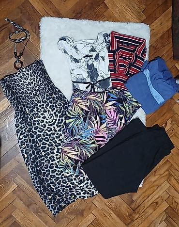 Paket sadrzi 3 majice,2 para pantalone i jednu haljinu. ZA DOSATNE na lalafo.rs Paket sadrzi 3 majice,2 para pantalone i jednu haljinu. ZA DOSATNE