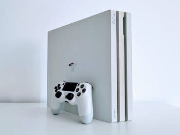 Sony Playstation 4 PRO od 1Tb, puna instaliranih igrica. Bela sa na lalafo.rs Sony Playstation 4 PRO od 1Tb, puna instaliranih igrica. Bela sa
