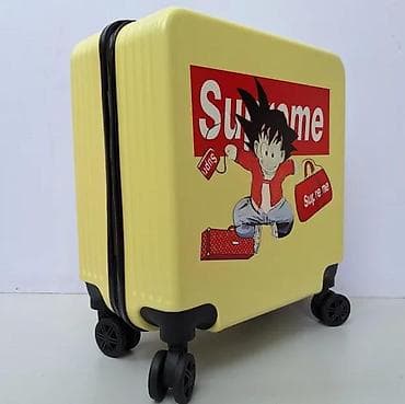 Travel suitcases and bags: Putni kofer na točkiće – žuta školjka sa printom anime lika i velikim at lalafo.rs — 6 Travel suitcases and bags: Putni kofer na točkiće – žuta školjka sa printom anime lika i velikim — 6
