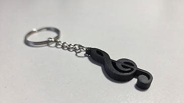 Ovaj privezak za ključeve ima elegantan dizajn u obliku violinskog na lalafo.rs — 2 Ovaj privezak za ključeve ima elegantan dizajn u obliku violinskog — 2