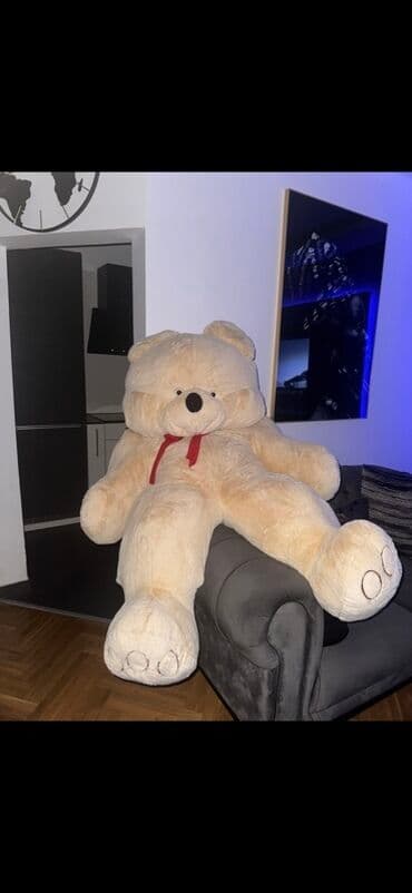 Gigantski plišani meda – bež boje sa crvenom mašnicom - Veličina na lalafo.rs Gigantski plišani meda – bež boje sa crvenom mašnicom - Veličina