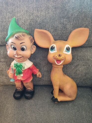 Dve stare gumene igračke: Pinokio visine oko 35cm kome se može na lalafo.rs Dve stare gumene igračke: Pinokio visine oko 35cm kome se može